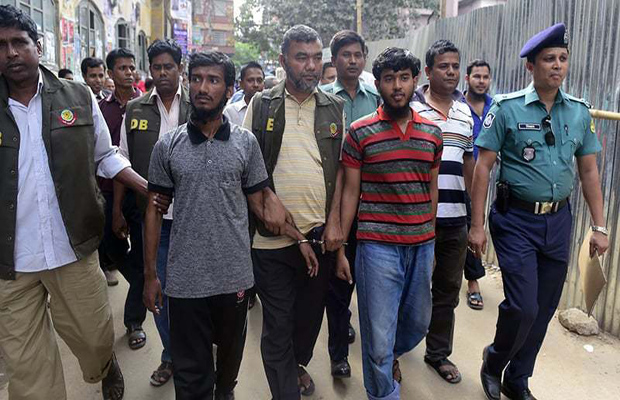 Bangladesh police escort two men accused in the murder of blogger Washiqur Rahman for a court appearance in Dhaka (Photo: AFP) Bangladesh police escort two men accused in the murder of blogger Washiqur Rahman for a court appearance in Dhaka (Photo: AFP)